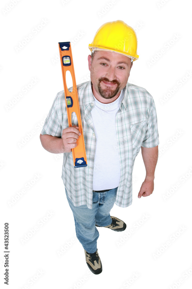 Builder with a spirit level
