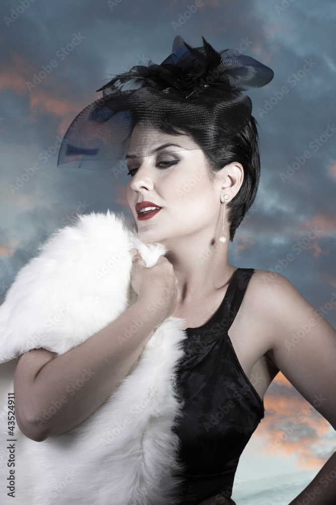 Sad Widow on sunset background, beautiful woman with black veil Sad Widow on sunset background, beautiful woman with black veil