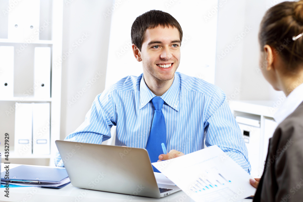 Young businessman in the office Young businessman in the office