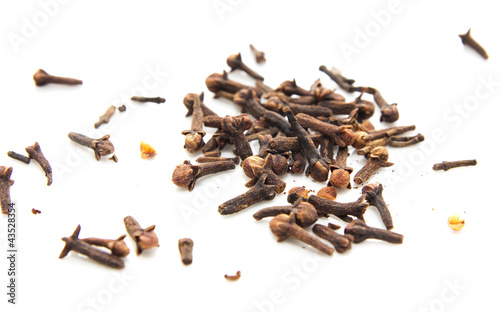 Dried cinnamon on a white background