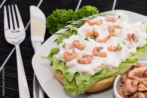 Shrimp-Salad on a roll (black background)