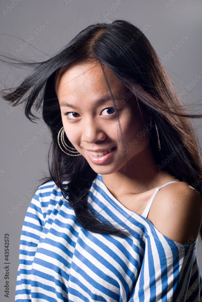 Portrait of charming girl with a flying hair Portrait of charming girl with a flying hair
