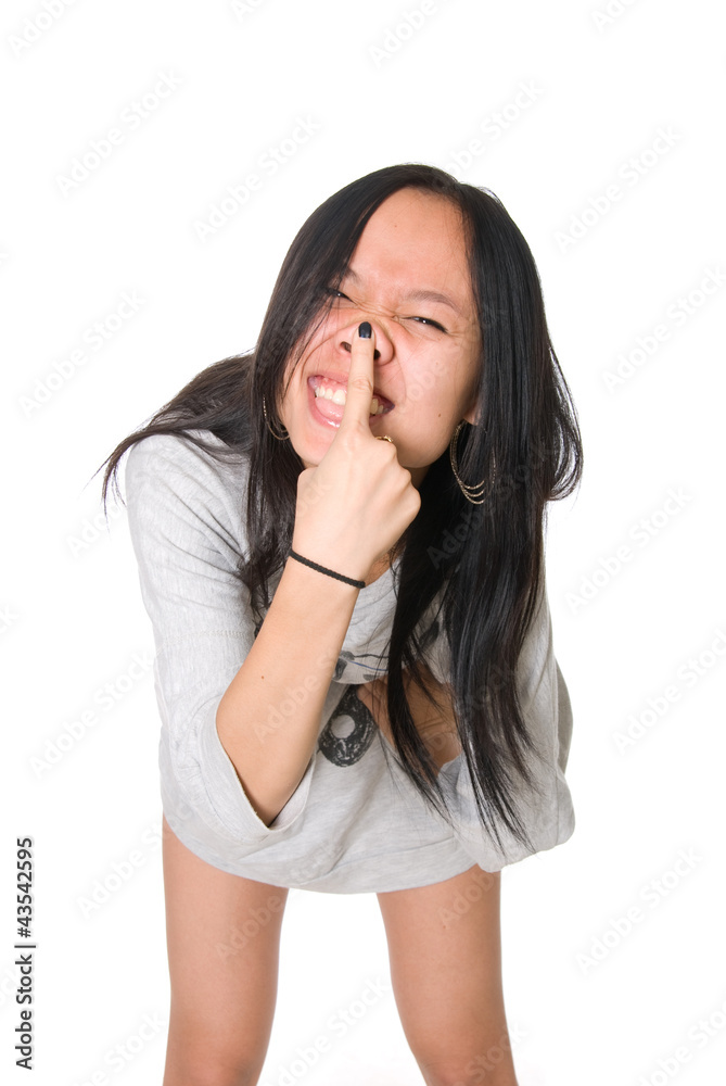 Girl is teased, presses a finger nose Girl is teased, presses a finger nose