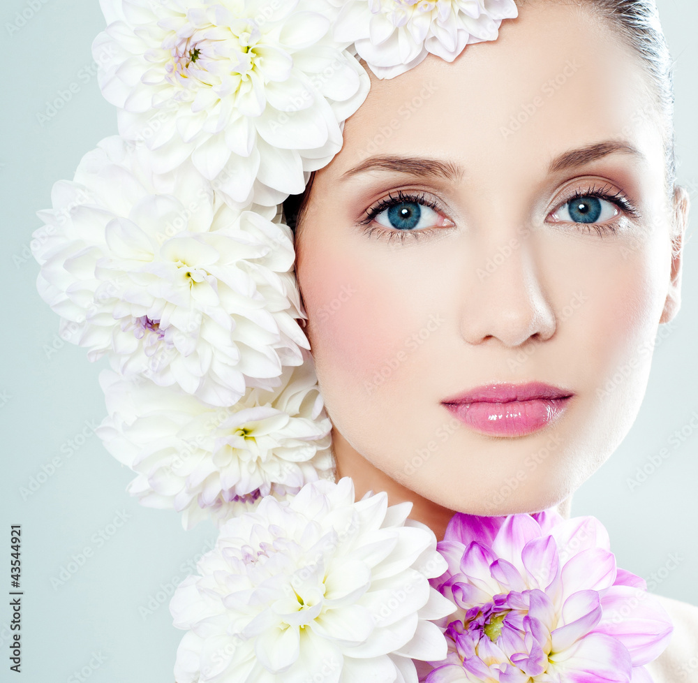woman's face surrounded by flowers woman's face surrounded by flowers