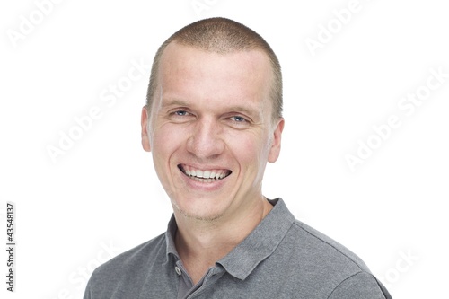 happy handsome guy smiling in camera