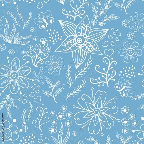 Seamless floral pattern in white ink on blue background