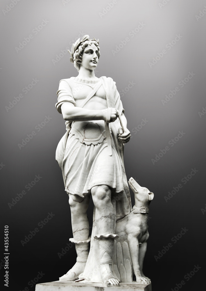 Antique sculpture man with dog