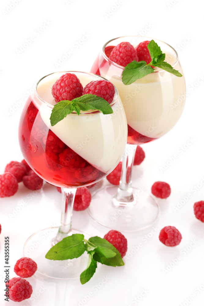 fruit jelly with raspberries in glasses isolated on white fruit jelly with raspberries in glasses isolated on white