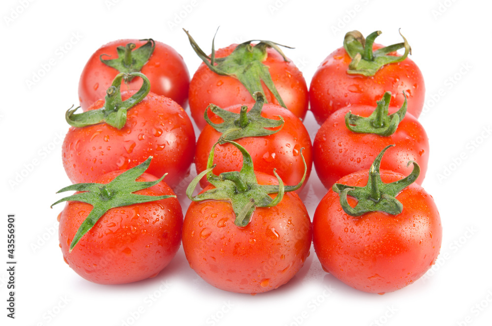 Fresh tomatoes isolated on the white Fresh tomatoes isolated on the white