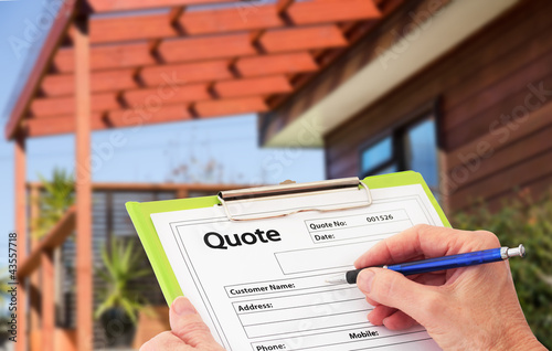 Hand Writing a quote for Home Building Renovation