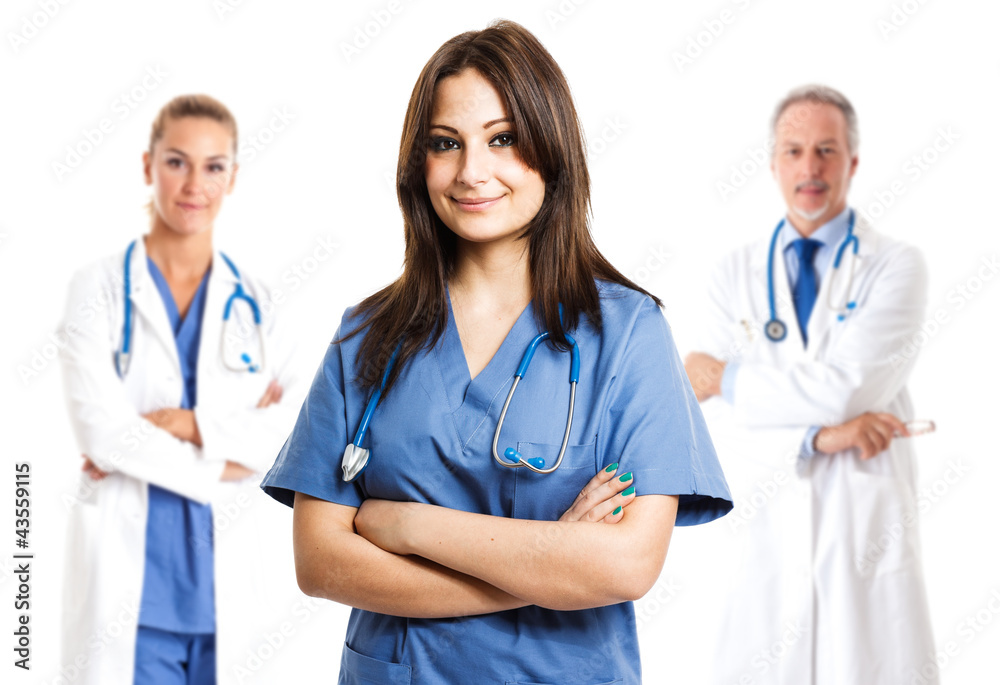Nurse in front of her medical team Nurse in front of her medical team