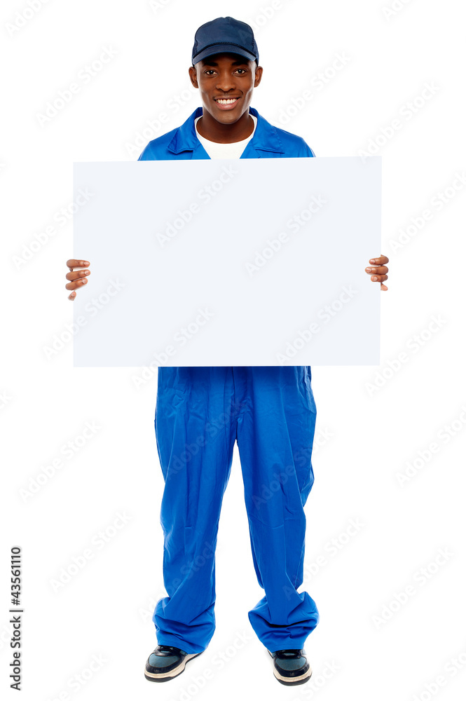 Courier guy presenting blank white billboard Courier guy presenting blank white billboard