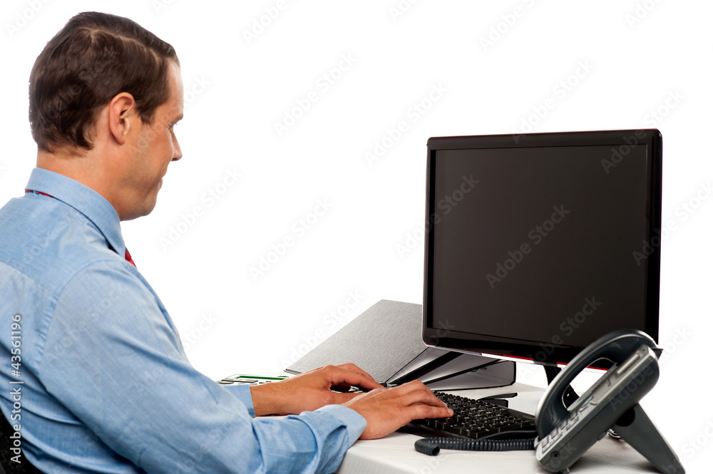Side view male accountant working in office Side view male accountant working in office