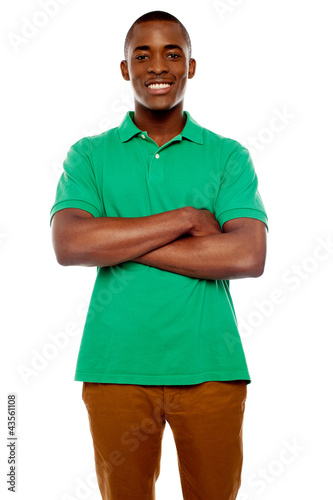 Smiling african guy with crossed arms