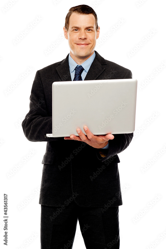 Confident executive using laptop and surfing web Confident executive using laptop and surfing web