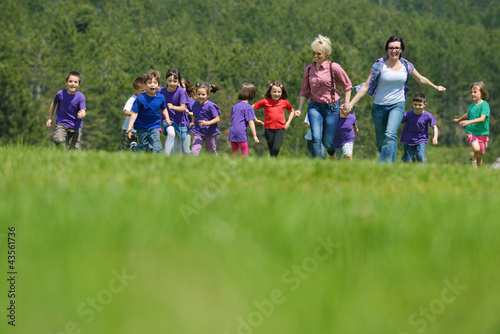 happy kids group  have fun in nature