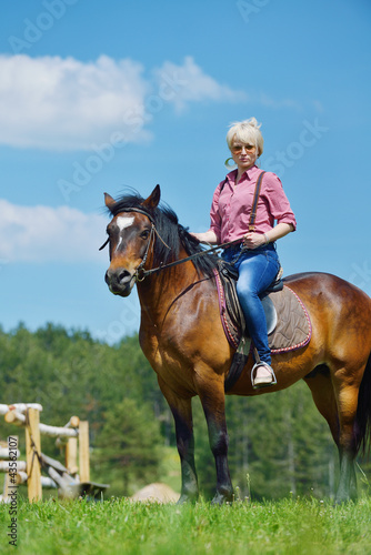 happy woman ride horse