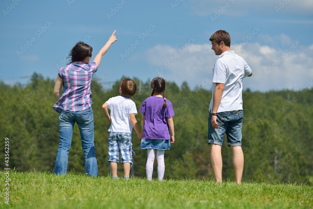 happy young family have fun outdoors happy young family have fun outdoors