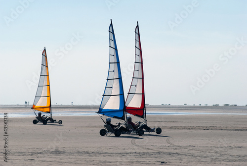 Land sailing on the beach in summer