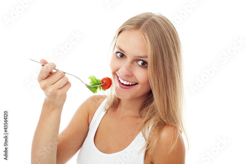Pretty Girl eating salad. Isolated