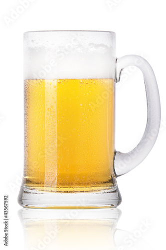 big Frosty glass of light beer with foam isolated