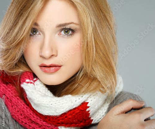 A photo of beautiful girl is in winter clothes