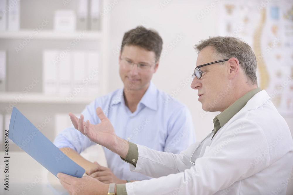 Doctor and patient discussing blood-test results