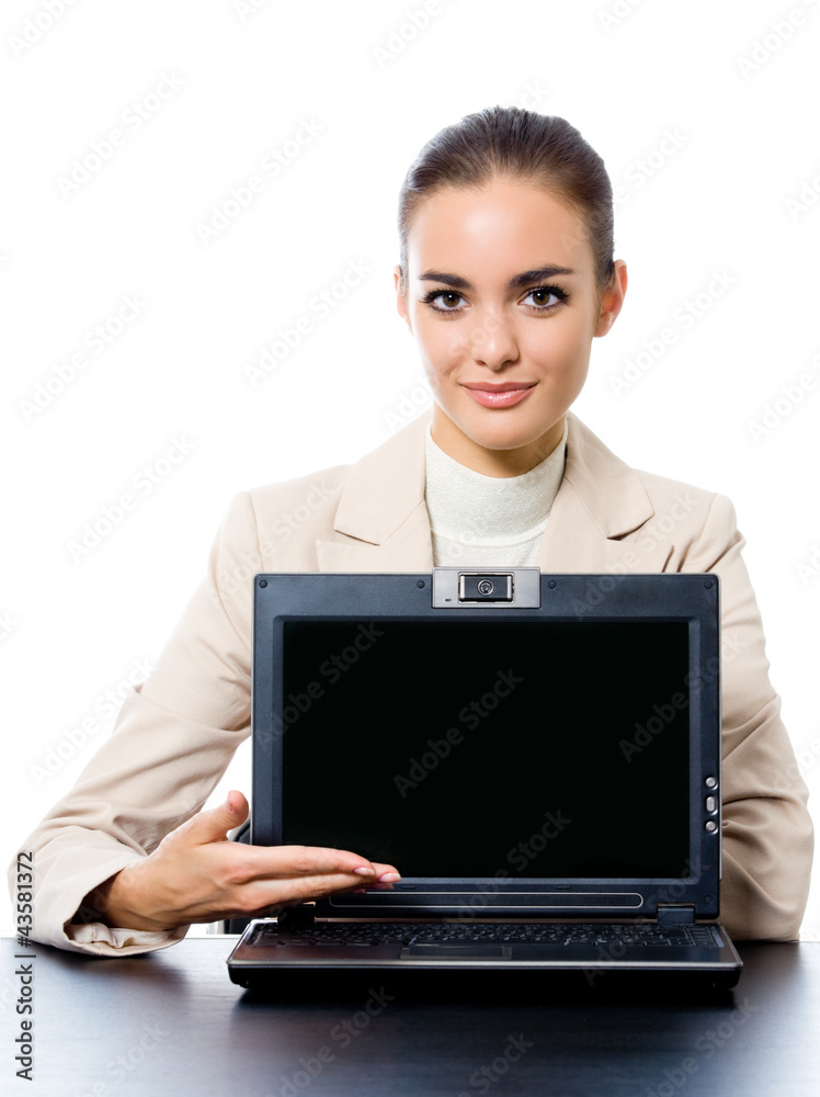 Businesswoman showing laptop with copyspace Businesswoman showing laptop with copyspace