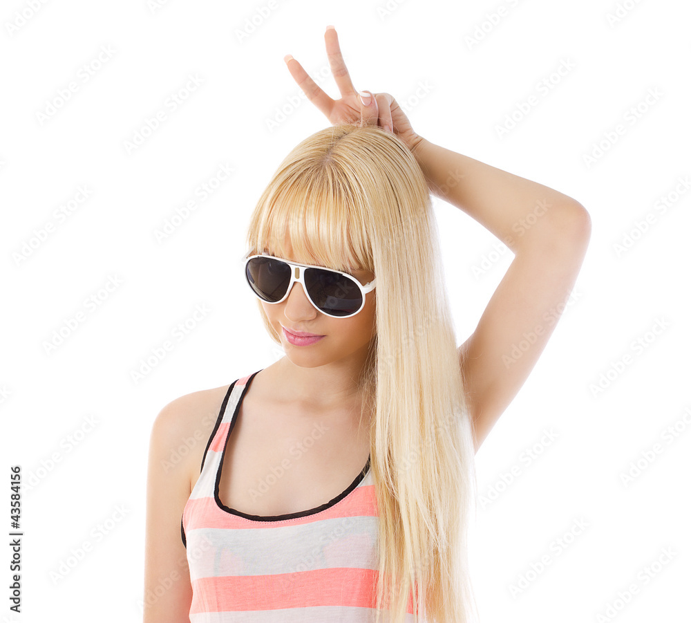 Woman using her fingers as bunny ears Woman using her fingers as bunny ears
