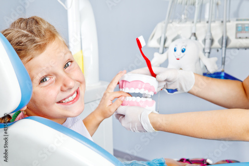 Fototapeta Naklejka Na Ścianę i Meble -  Happy child with toy dentures