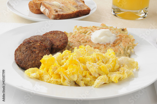 Sausage patties iwth scrambled eggs photo