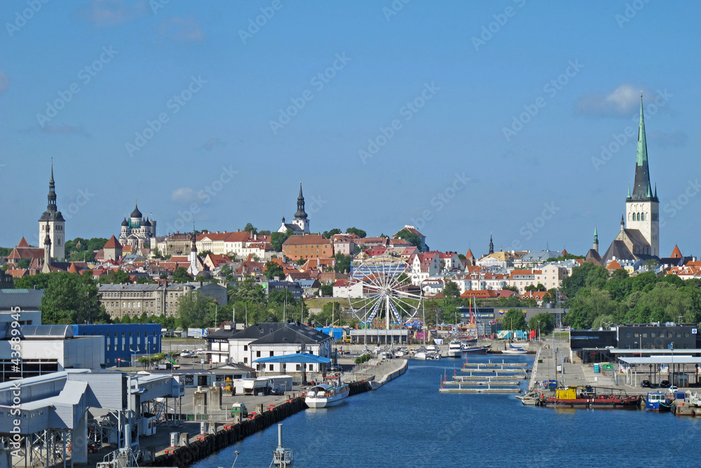 panorama of the town of Estonia with the rides on the river and