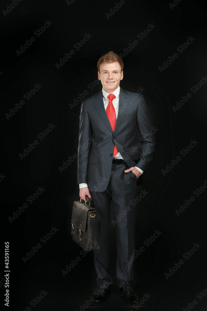 Portrait of successful business man with bag Portrait of successful business man with bag