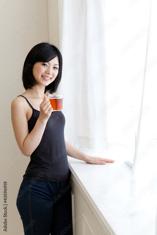 a young asian woman relaxing in morning a young asian woman relaxing in morning