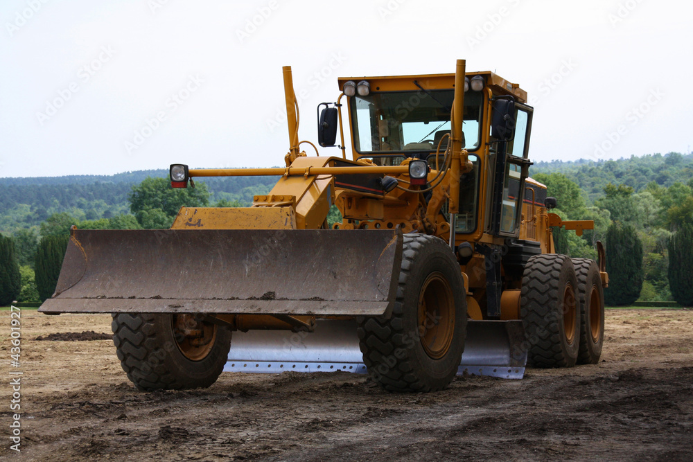 Véhicule niveleuse chantier travaux publics Véhicule niveleuse chantier travaux publics