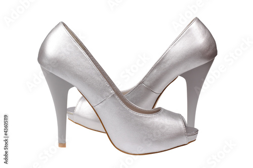 A pair of silver women's heel shoes with clipping path