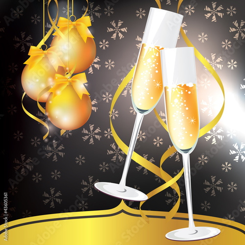 glasses of champagne on an abstract background. New Year card.