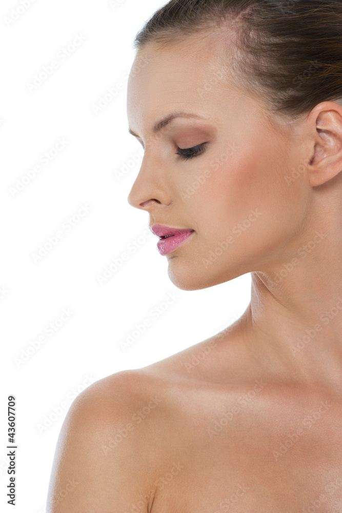 Beauty portrait of girl in profile isolated on white Beauty portrait of girl in profile isolated on white