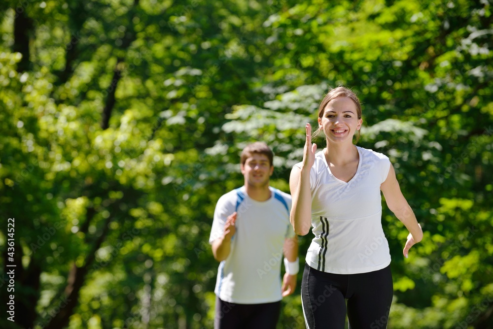 Obraz premium Young couple jogging