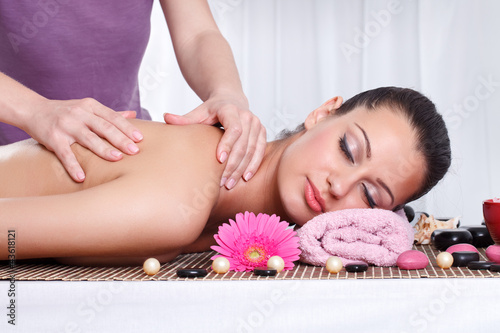 woman receiving back massage