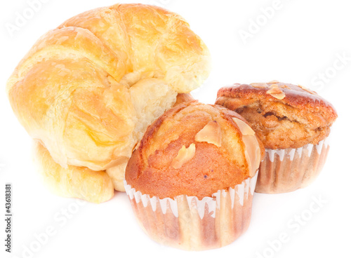 butter croissant with freshly mixed muffin on the white backgrou
