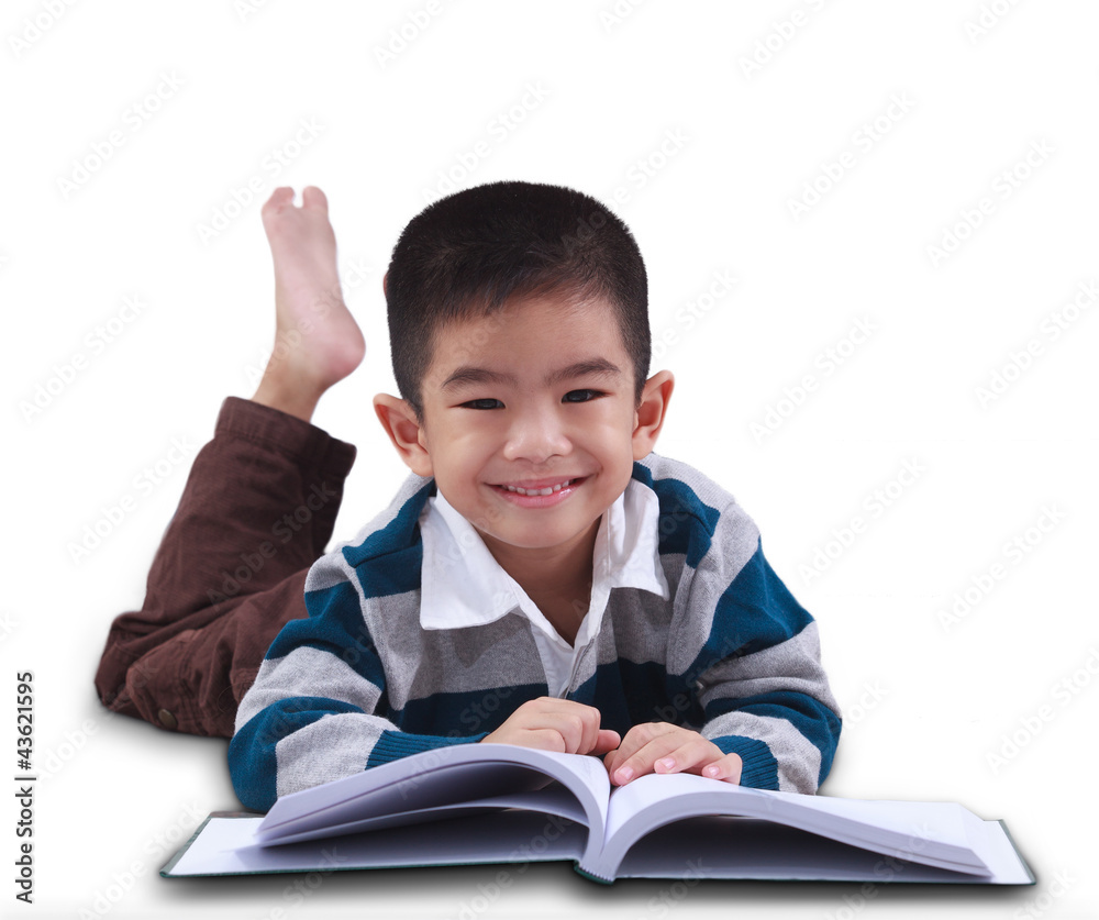 Asia boy smiles and read a book Asia boy smiles and read a book