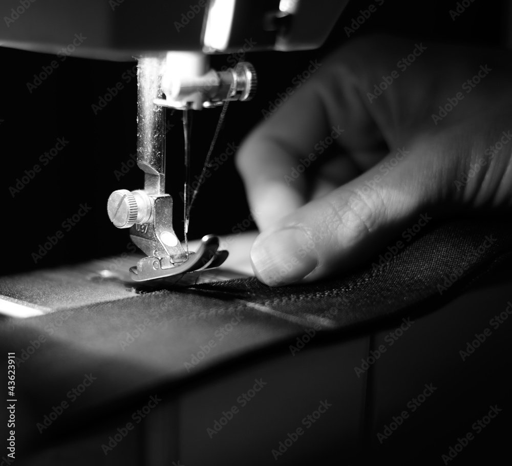 Seamstress Using Sewing Machine Stock Photo Adobe Stock