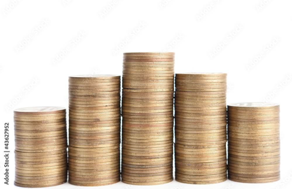 Bronze coins stand vertically in columns, isolated on white. Bronze coins stand vertically in columns, isolated on white.