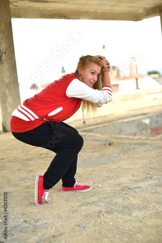 Teenage girl dancing hip-hop