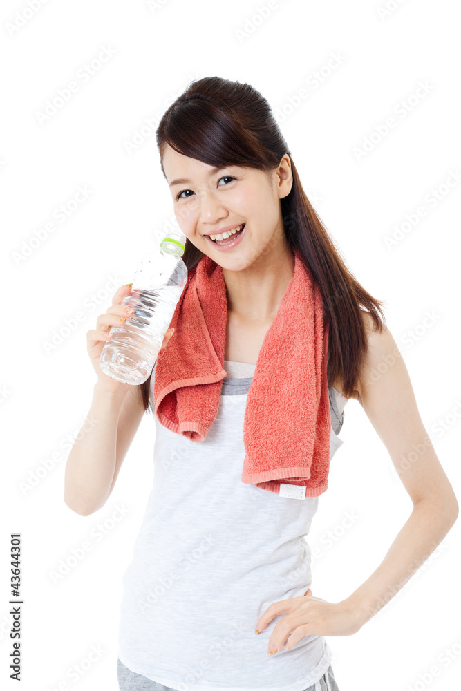 Beautiful young woman drinking water at workout Beautiful young woman drinking water at workout