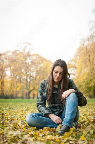 Young woman in depression outdoor