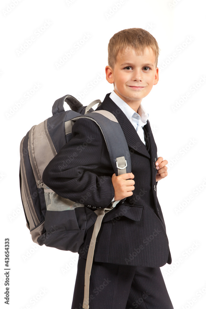 Schoolboy sitting on books Schoolboy sitting on books