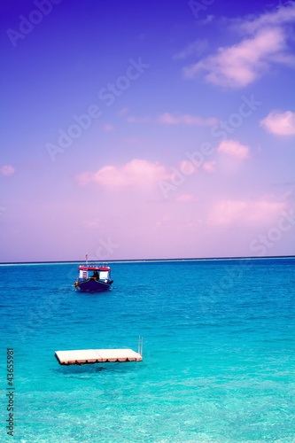 Stock Photo:Sailboat sailing in the morning with blue cloudy sky © addingwater