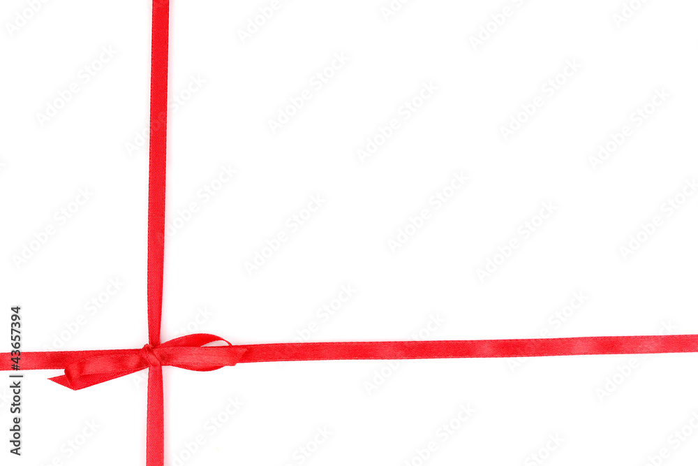 Red satin bow and ribbon isolated on white Red satin bow and ribbon isolated on white